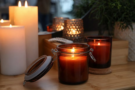 bigstock-Lit-Candles-On-Wooden-Dressing-449403933