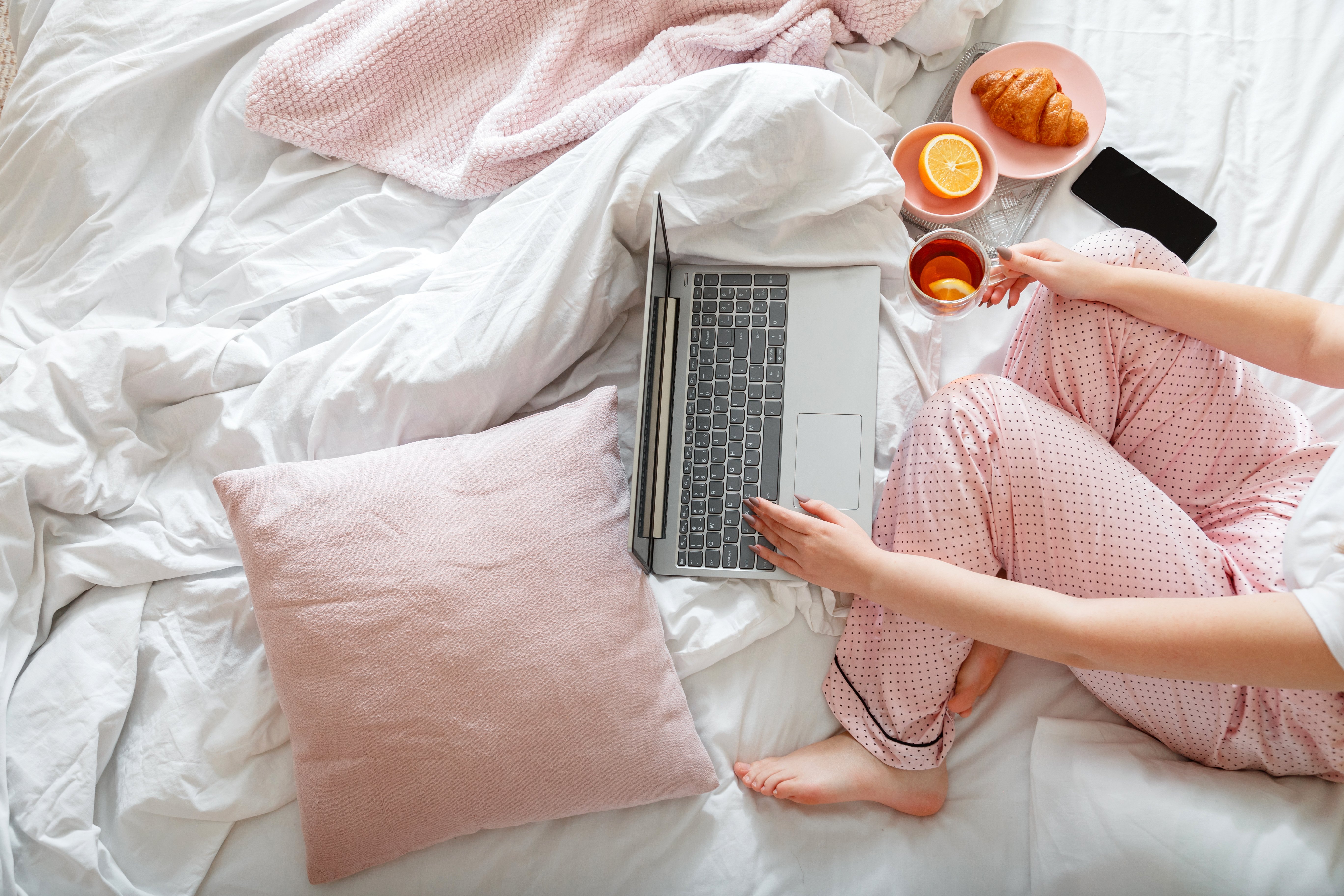 bigstock-Young-Woman-In-Pajamas-Sitting-430236994